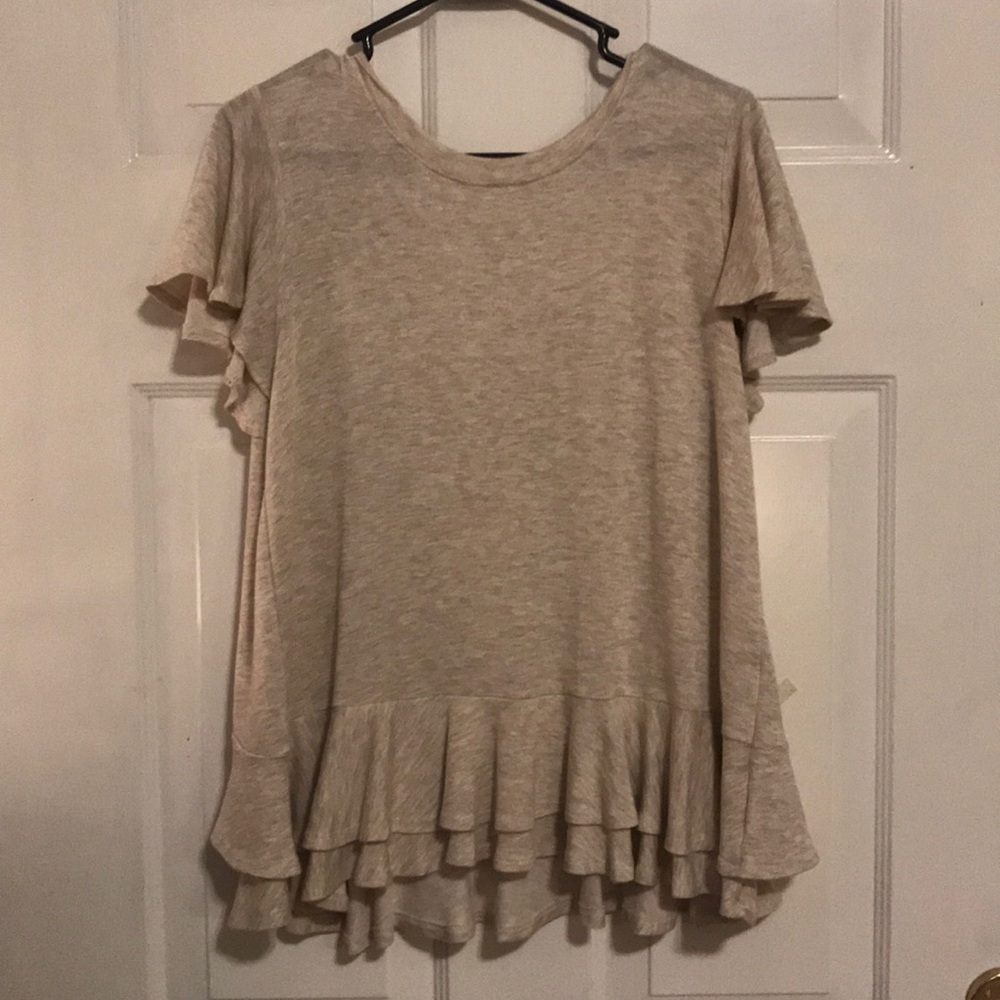 Adorable taupe top with statement bow back!